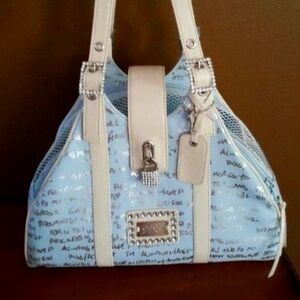 Dog Carrier by Cece Kent